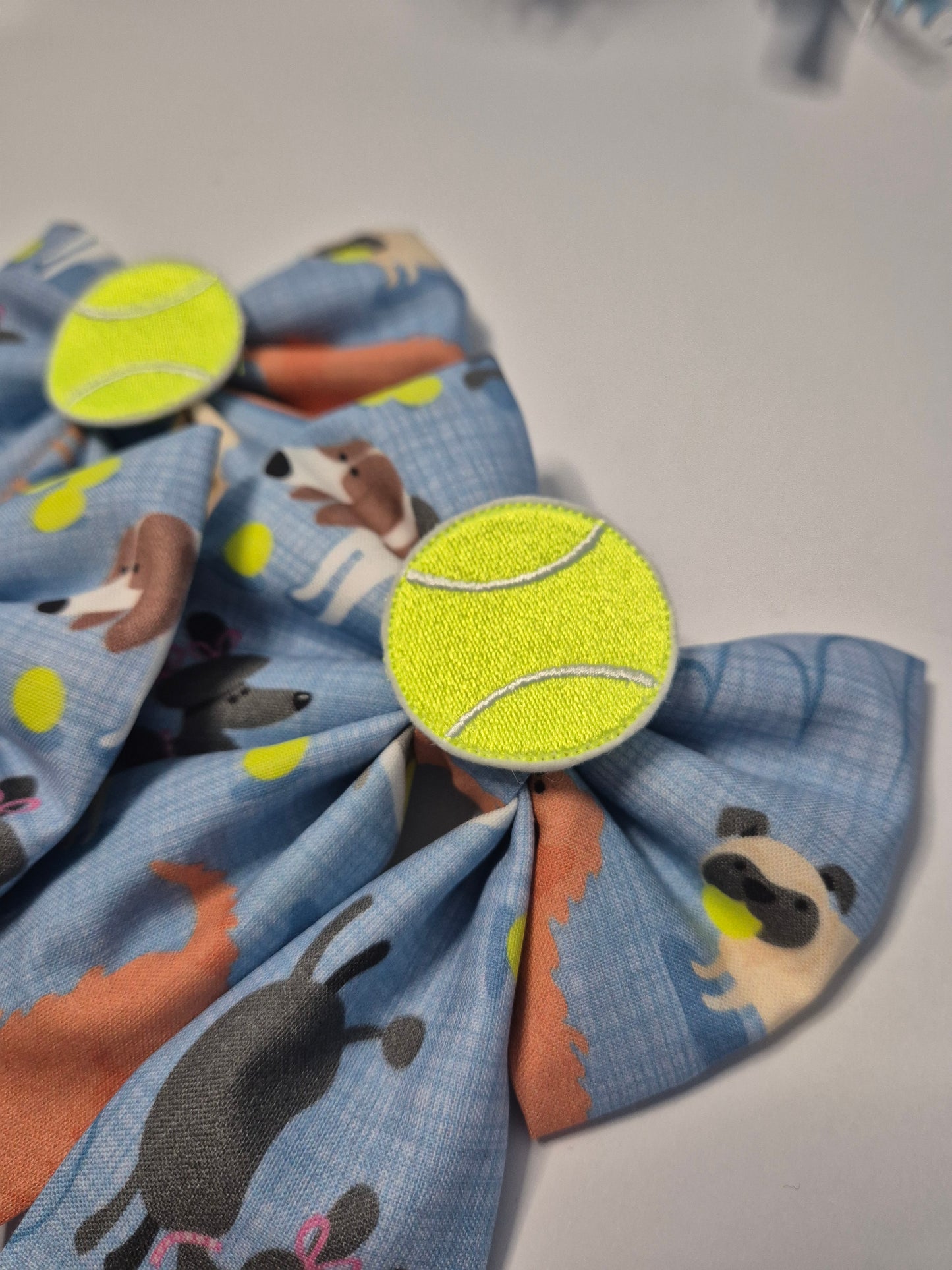 Dogs v tennis balls embroidered sailor bow