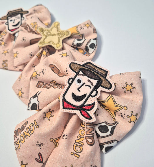 And beyond cowboy embroidered sailor bow